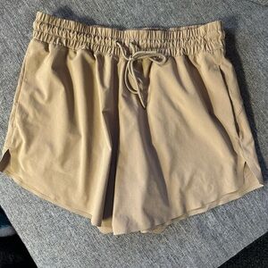 Never worn Athleta Khaki active  Shorts